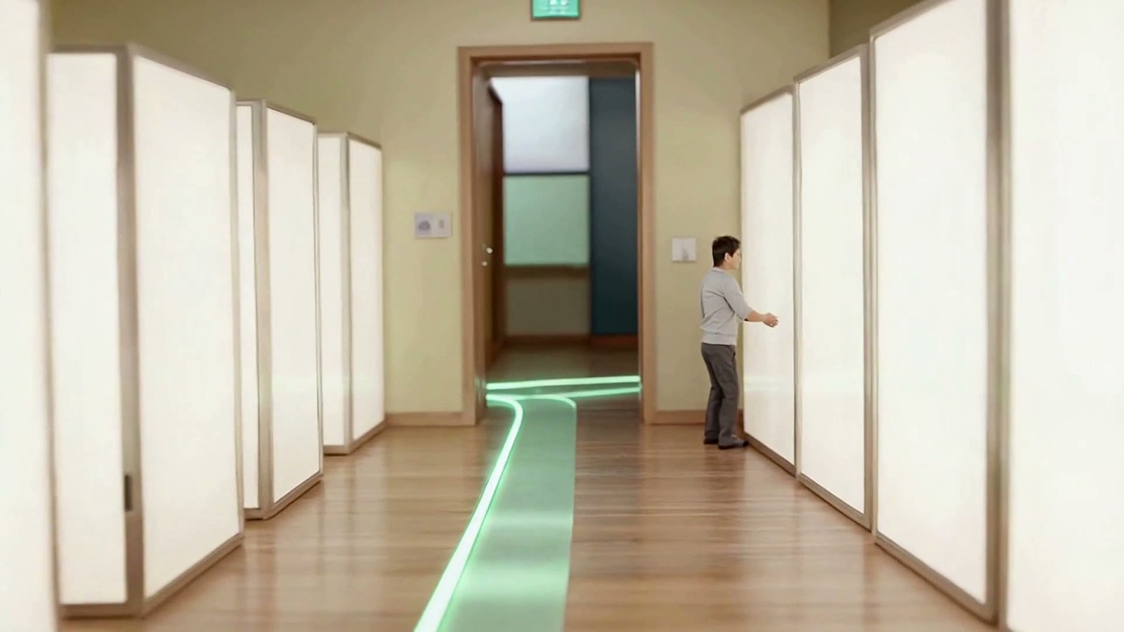 A diorama alcove where a team of figures pins up research and assembles glowing plan panels along the mint path.